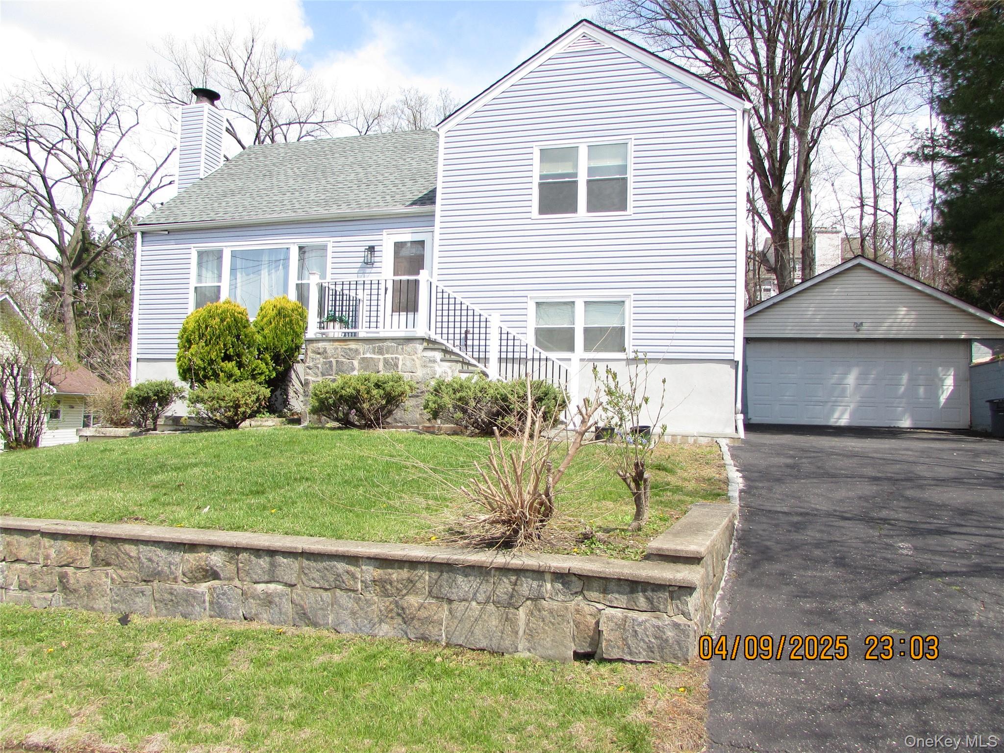 Welcome to Candlewood Drive. This stunning split level ranch has three...