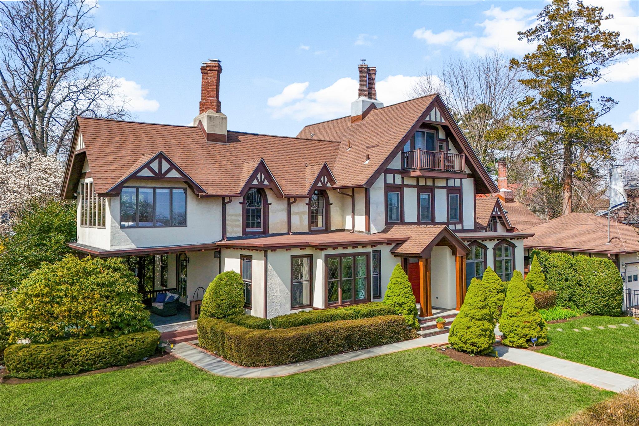 Steps from the Long Island Sound and perfectly sited on a wide, privat...