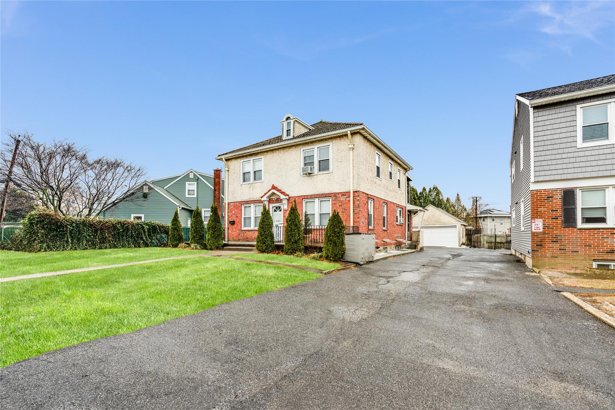 Welcome to this two-family residence, ideally located in vibrant Port...
