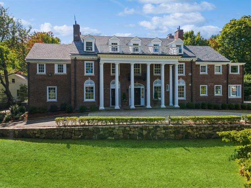 This magnificent 7 bedroom, 5 1/2 bath 1918 Georgian Colonial situated...