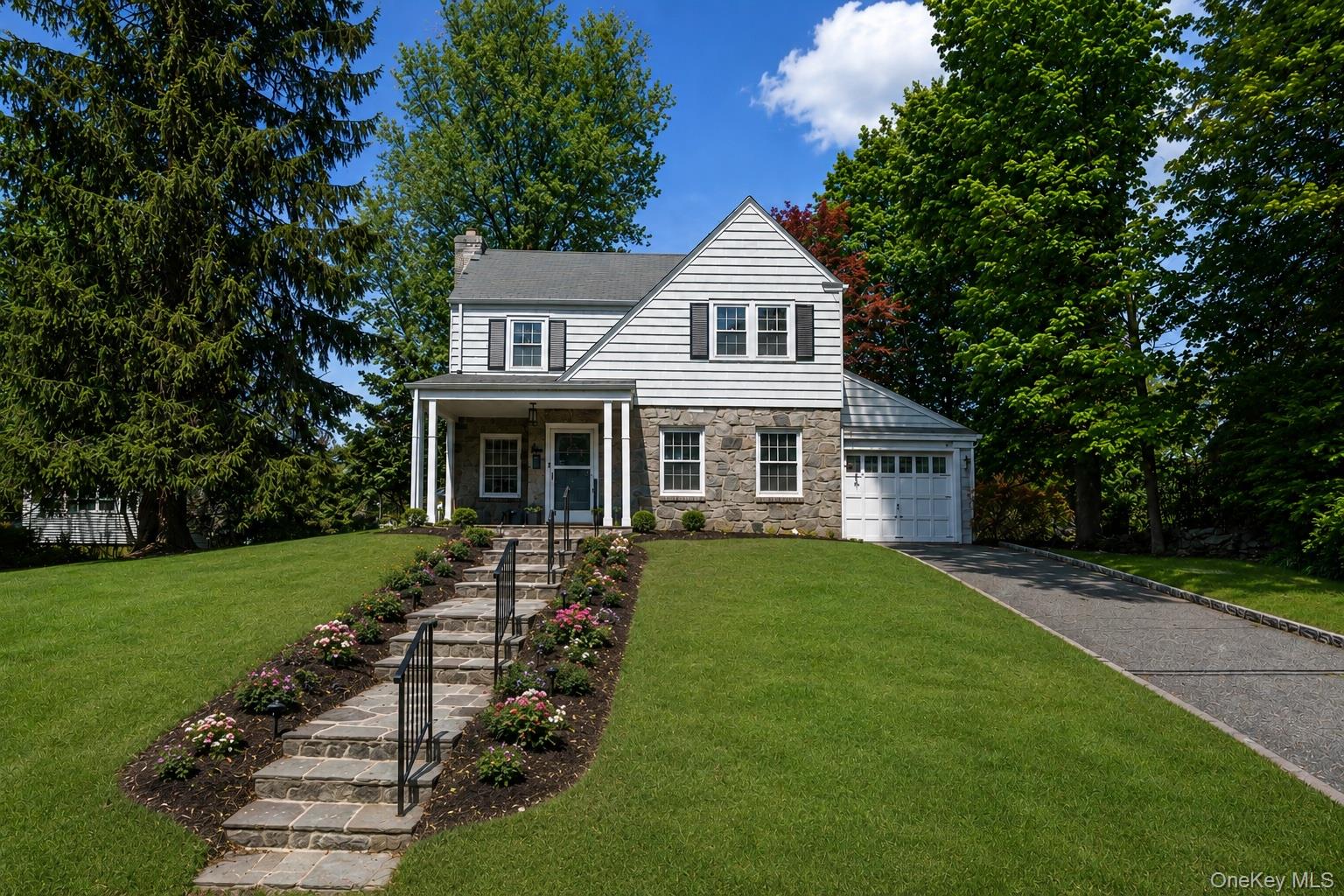 Welcome to 4 Abington Avenue, a classic Colonial with beautiful stonew...