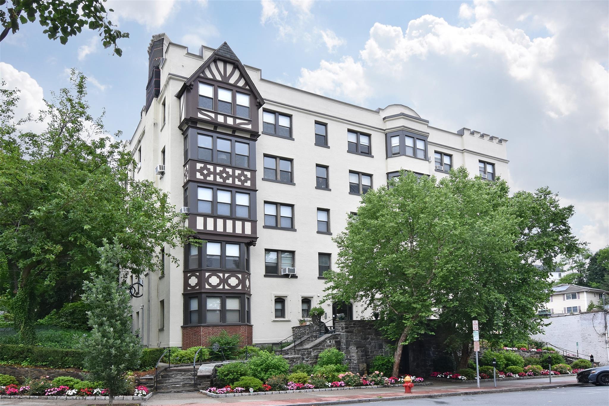 Welcome to 56 Pondfield Road West, Unit 1A – a bright, spacious, and b...
