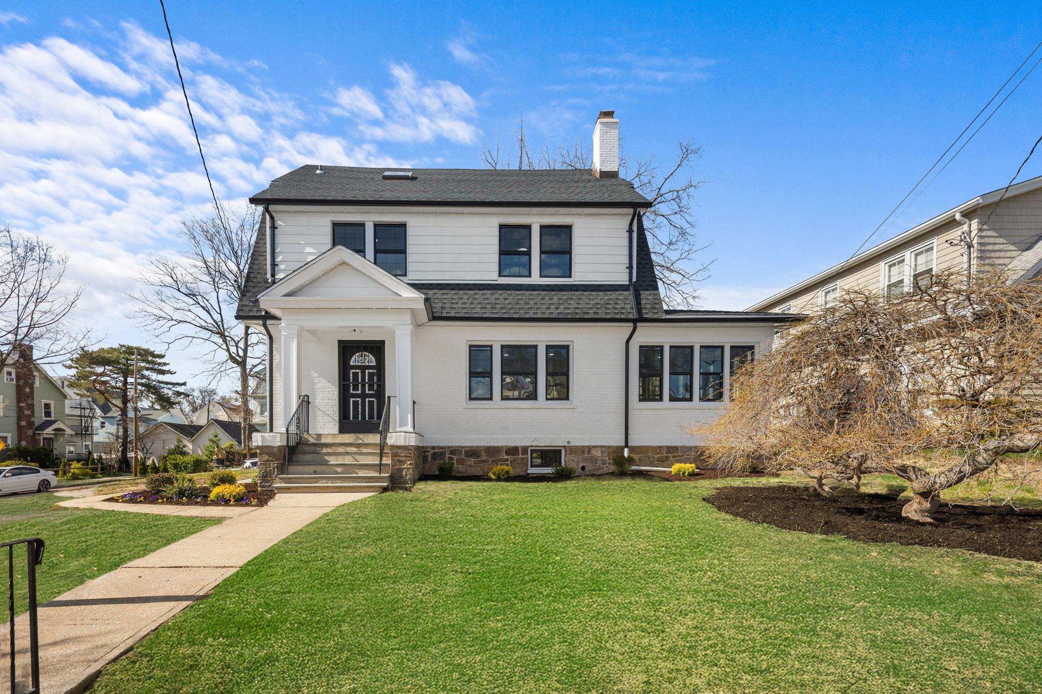Welcome to 107 Colonial Place, an exquisitely renovated Colonial resid...