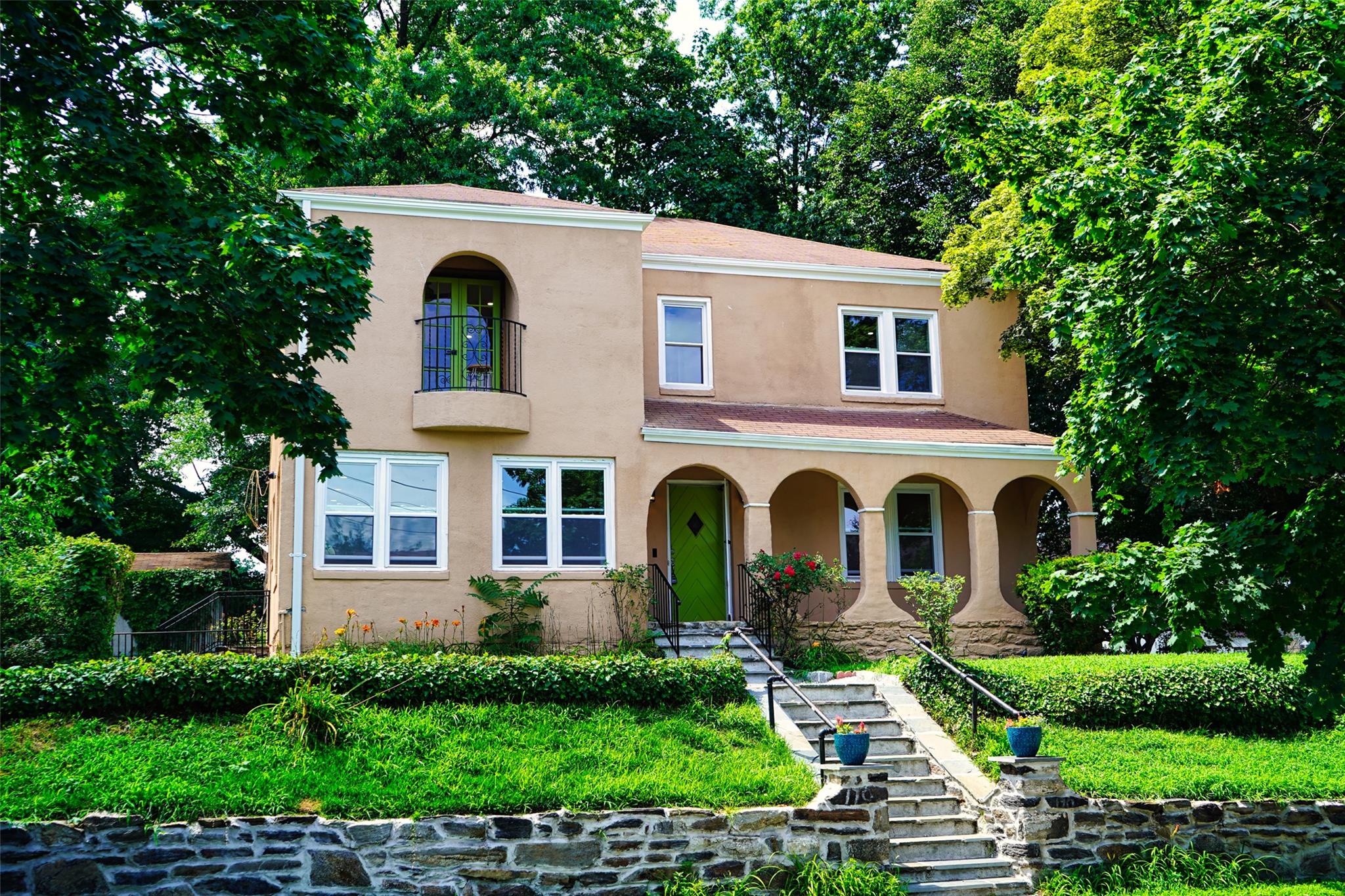 Welcome to 170 Lawrence Street — a stunning Mid-Century Mediterranean...