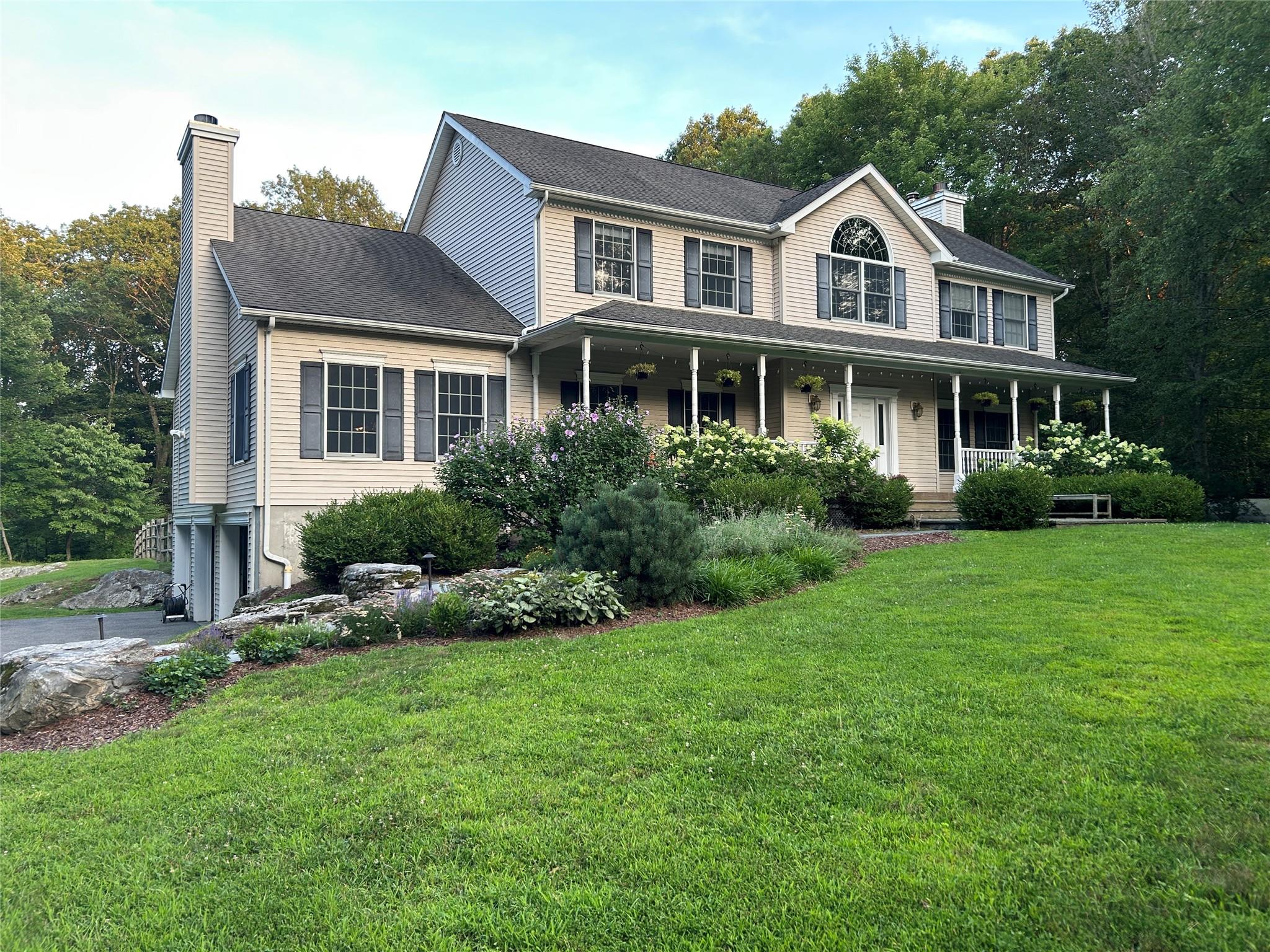 Estate-Style Living on 5 Serene Acres!  
Discover timeless elegance in...