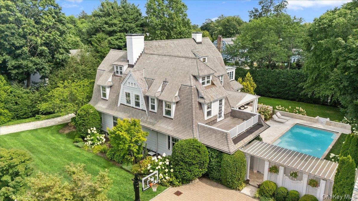 Elegant entertaining spaces, expansive outdoor amenities, a thoughtful...