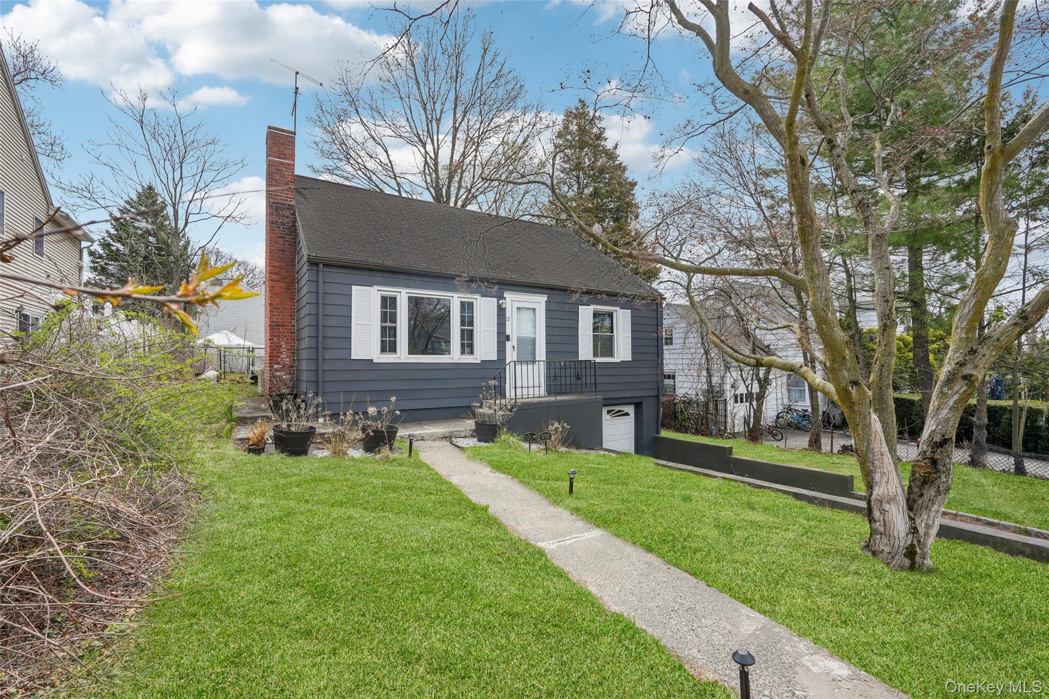 This beautifully updated Cape Cod-style home offers the perfect blend...