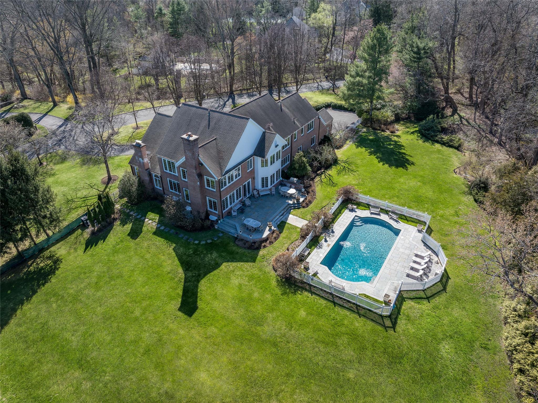 Magnificent 2-acre estate on one of Purchase’s most coveted streets! P...