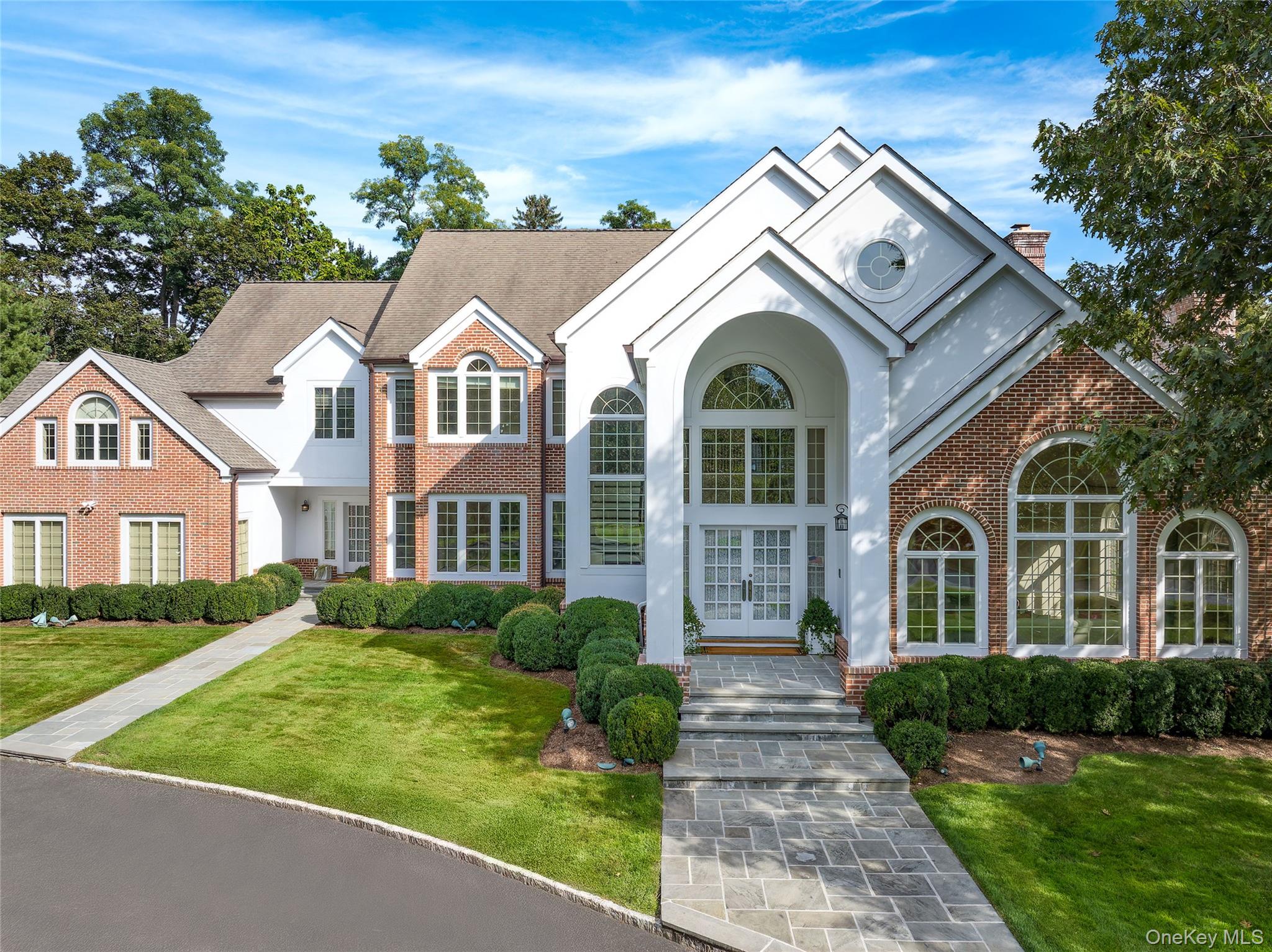 Magnificent 2-acre estate on one of Purchase’s most coveted streets! P...