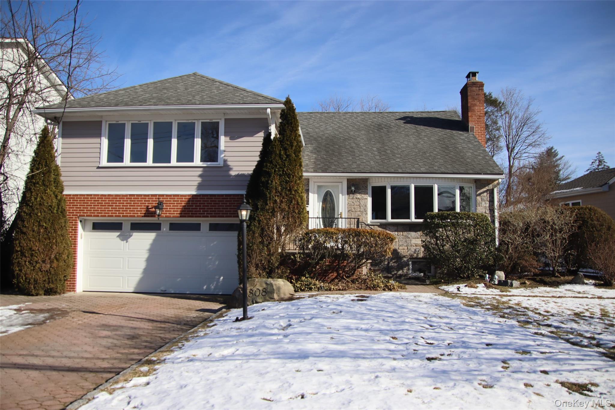 Discover this expansive and uniquely appointed five-level split home,...