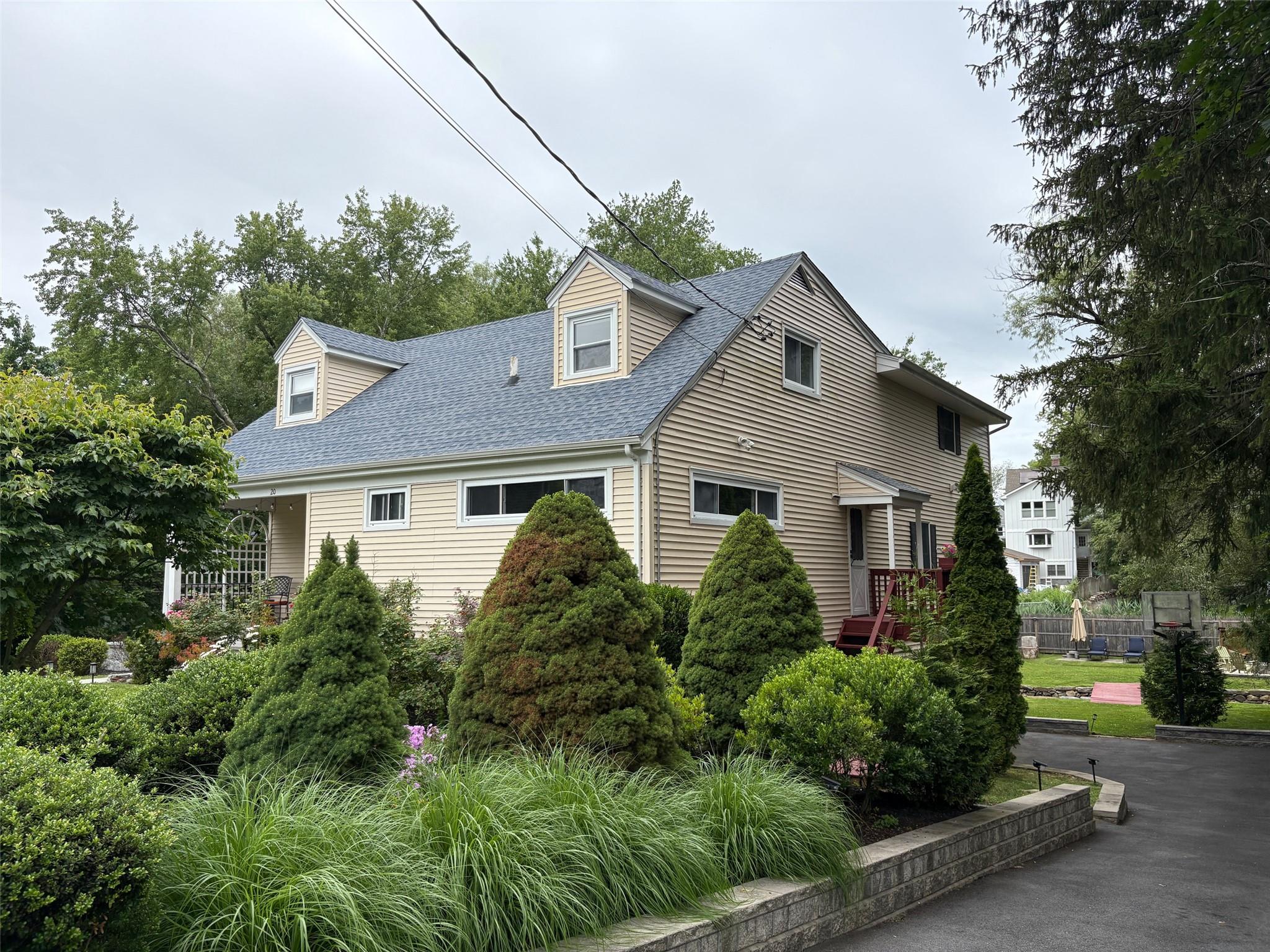 This Four Bedroom, 3 Bath expanded Cape offers an Open Floor plan on t...