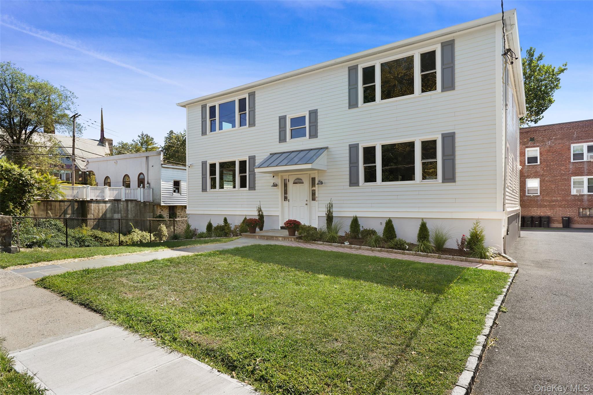 Experience upscale living in the heart of Rye—just steps from the trai...