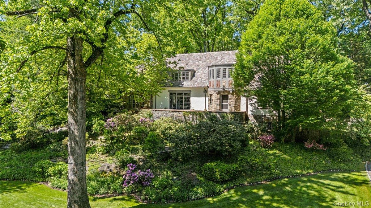 Set on a gentle rise with elevated views, this distinguished 4-bedroom...