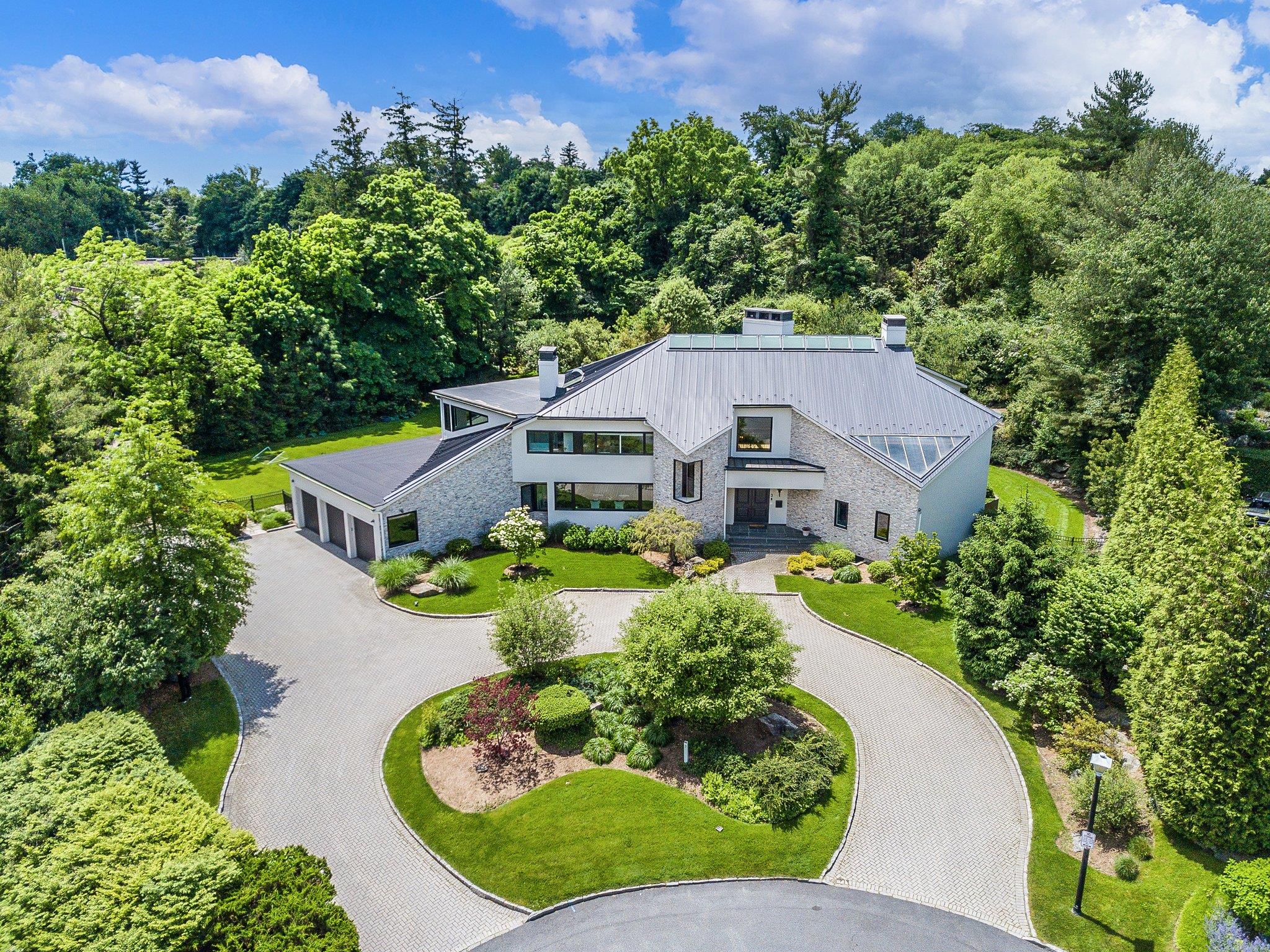 Resort style living at its finest in this dramatic Scarsdale contempor...