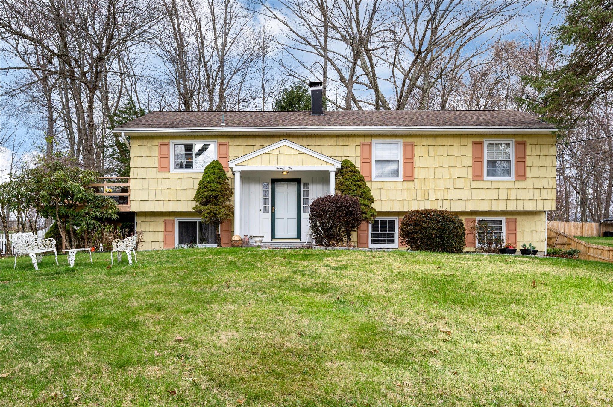 Welcome to this beautifully maintained raised ranch, nestled in a peac...
