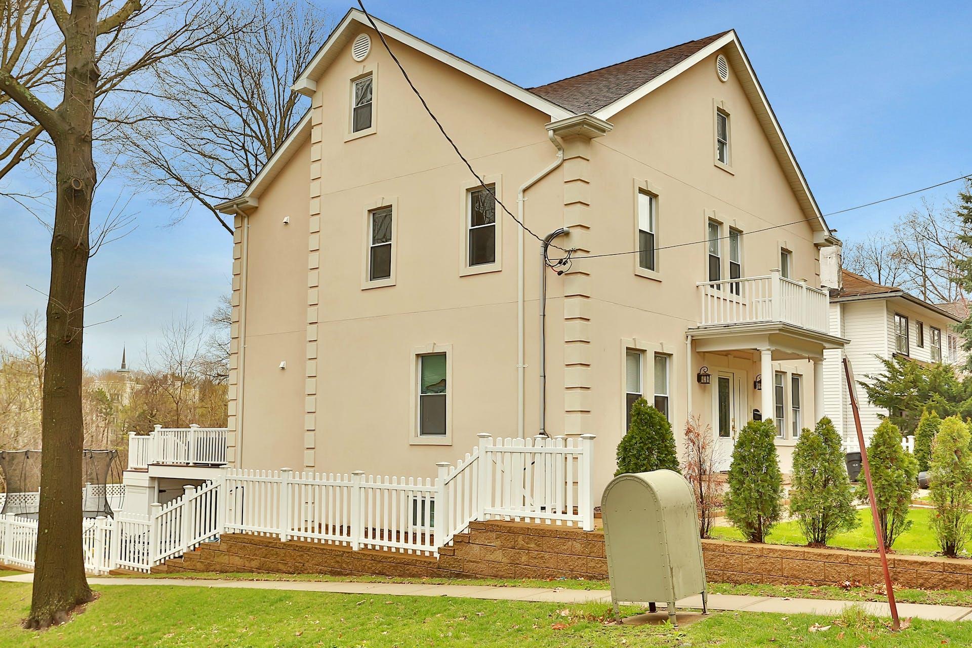 Stucco Center Hall Colonial located in the Armour Villa Cedar Knolls s...