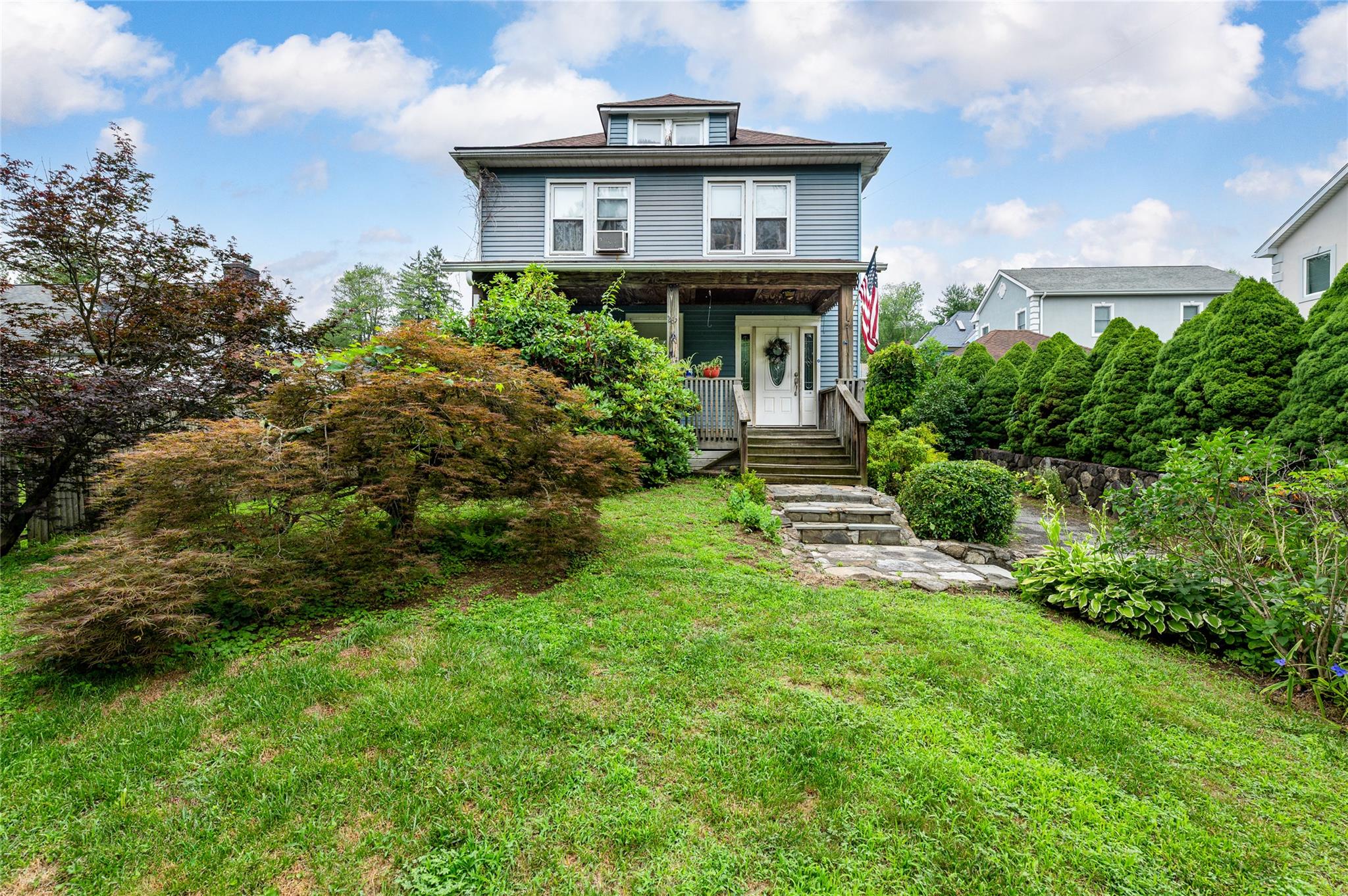 Classic Colonial full of warmth and charm. The entryway opens to a wel...