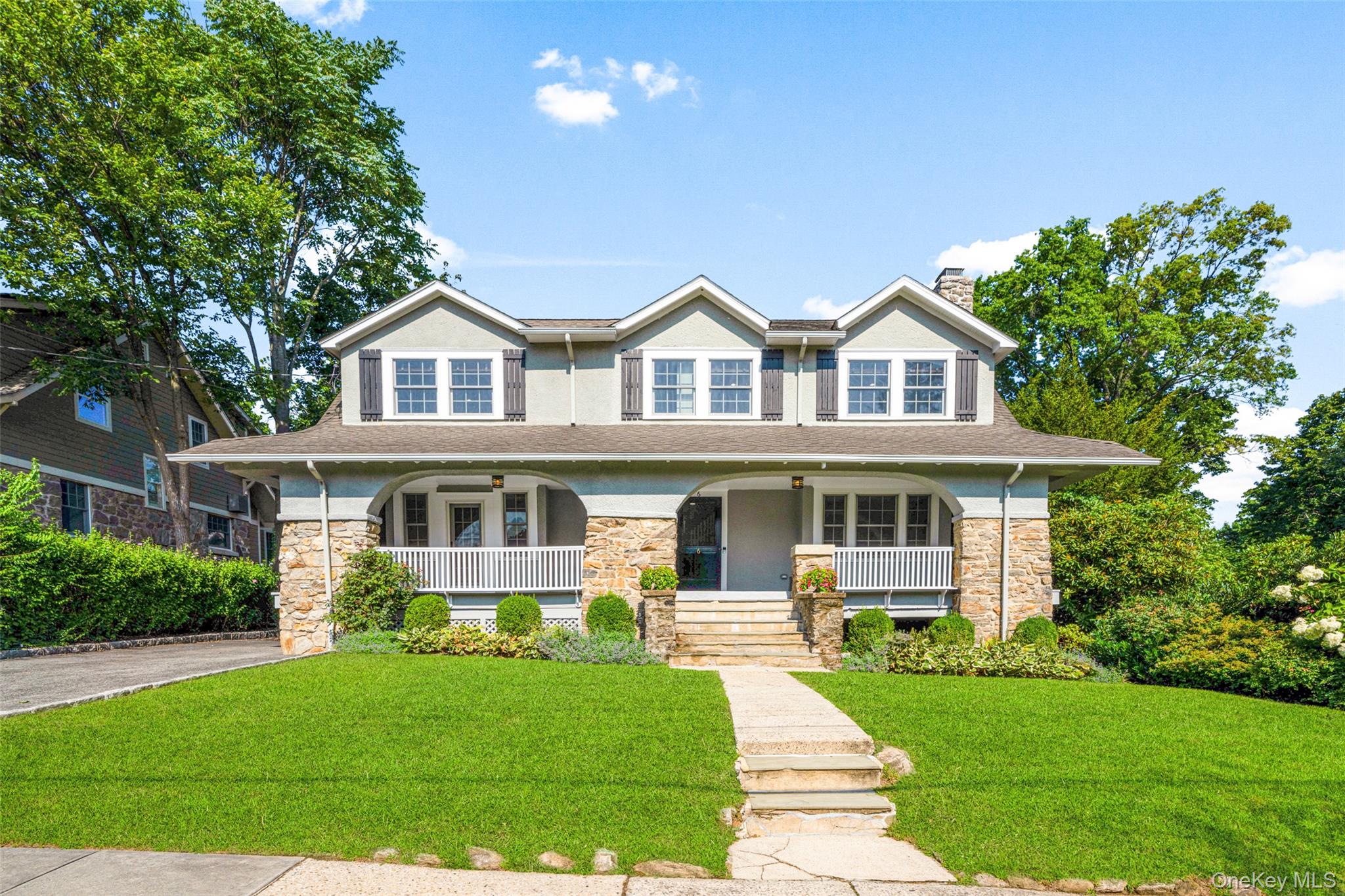 In-town charm with modern comfort in the heart of Larchmont. Nestled o...