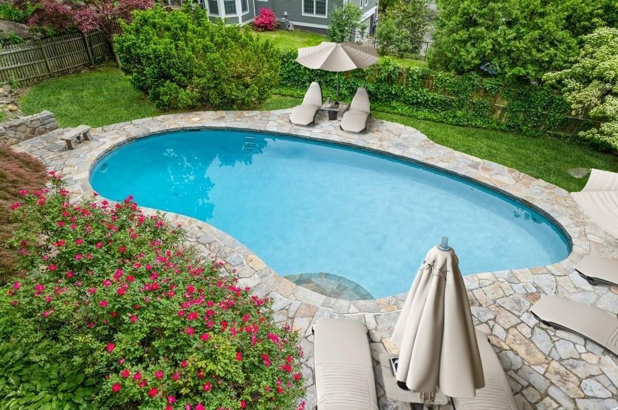 Beautifully expanded and updated Colonial at the end of a quiet cul-de...