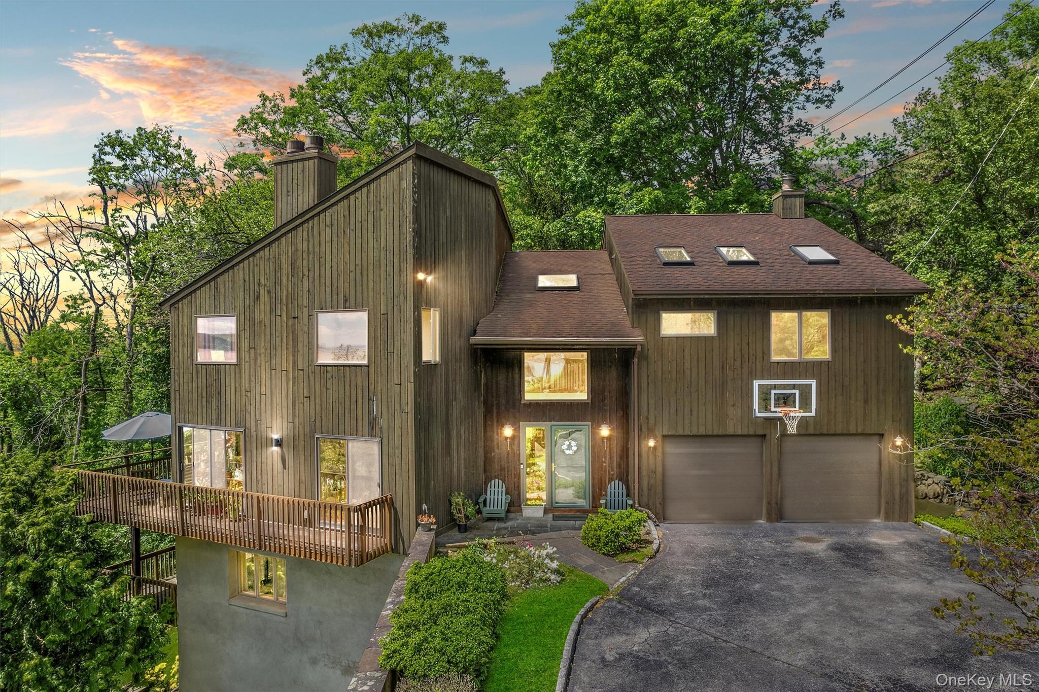 Perched above the Hudson River, this home offers truly stunning views...