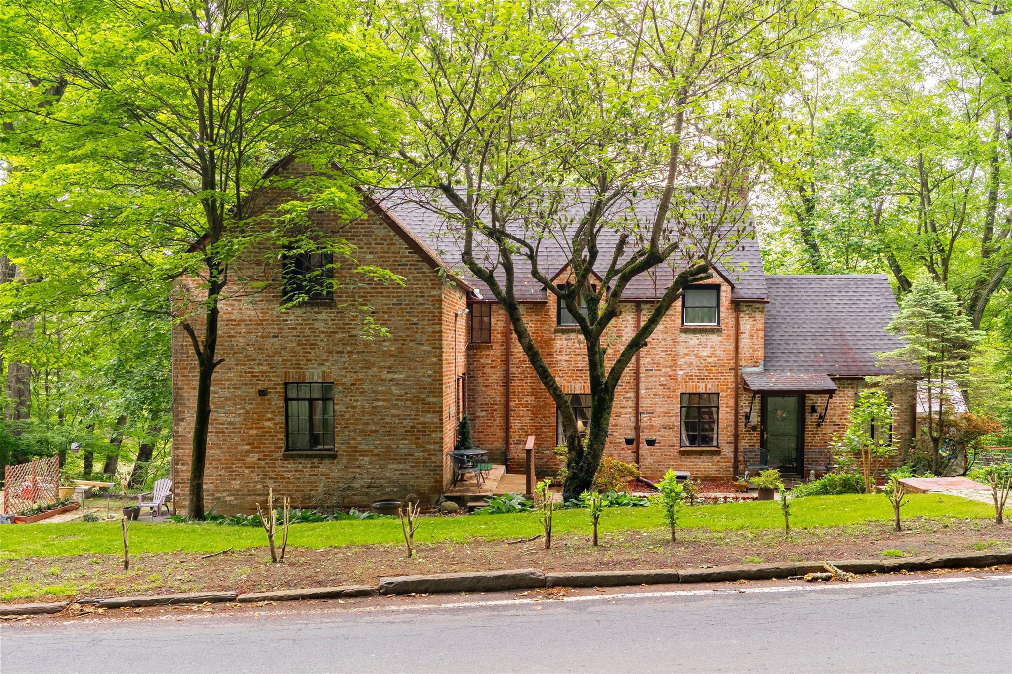 Rare opportunity to own a unique brick Tudor on a spacious 0.35-acre l...