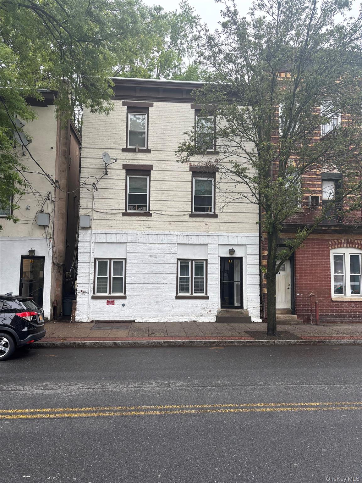 Investors take notice! This three-family property features two one-bed...