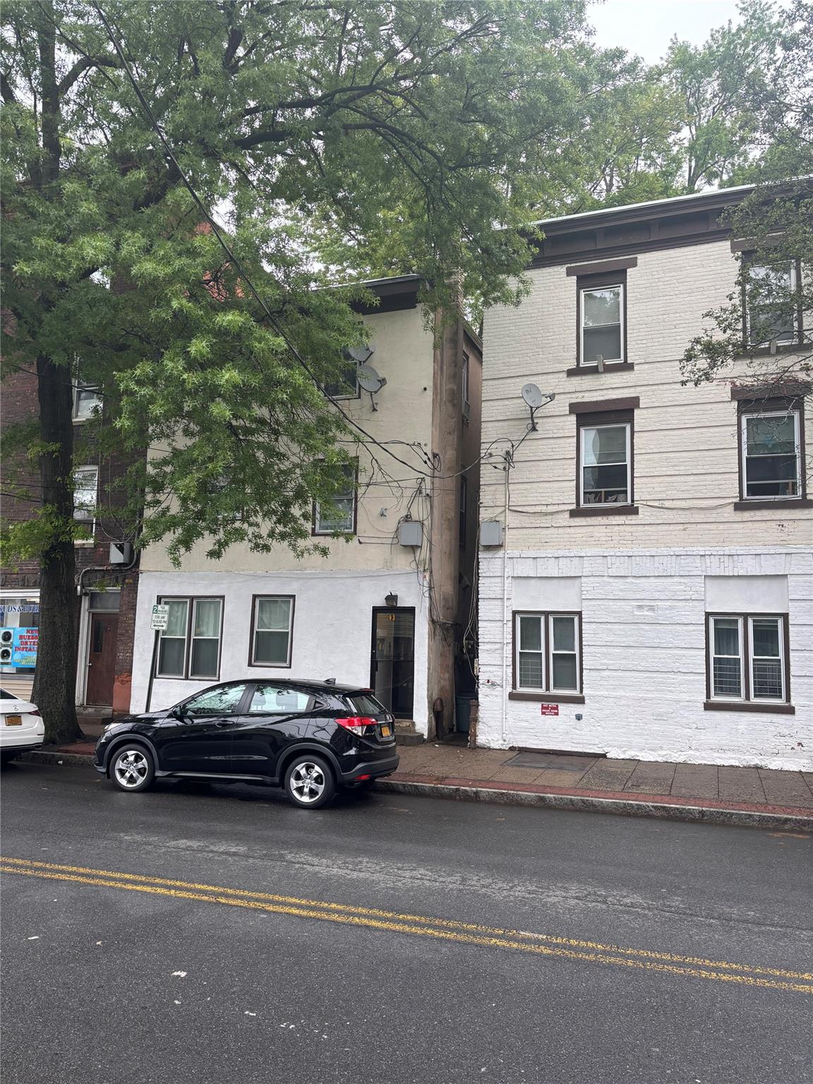 Investors, take note! This three-family property features three spacio...
