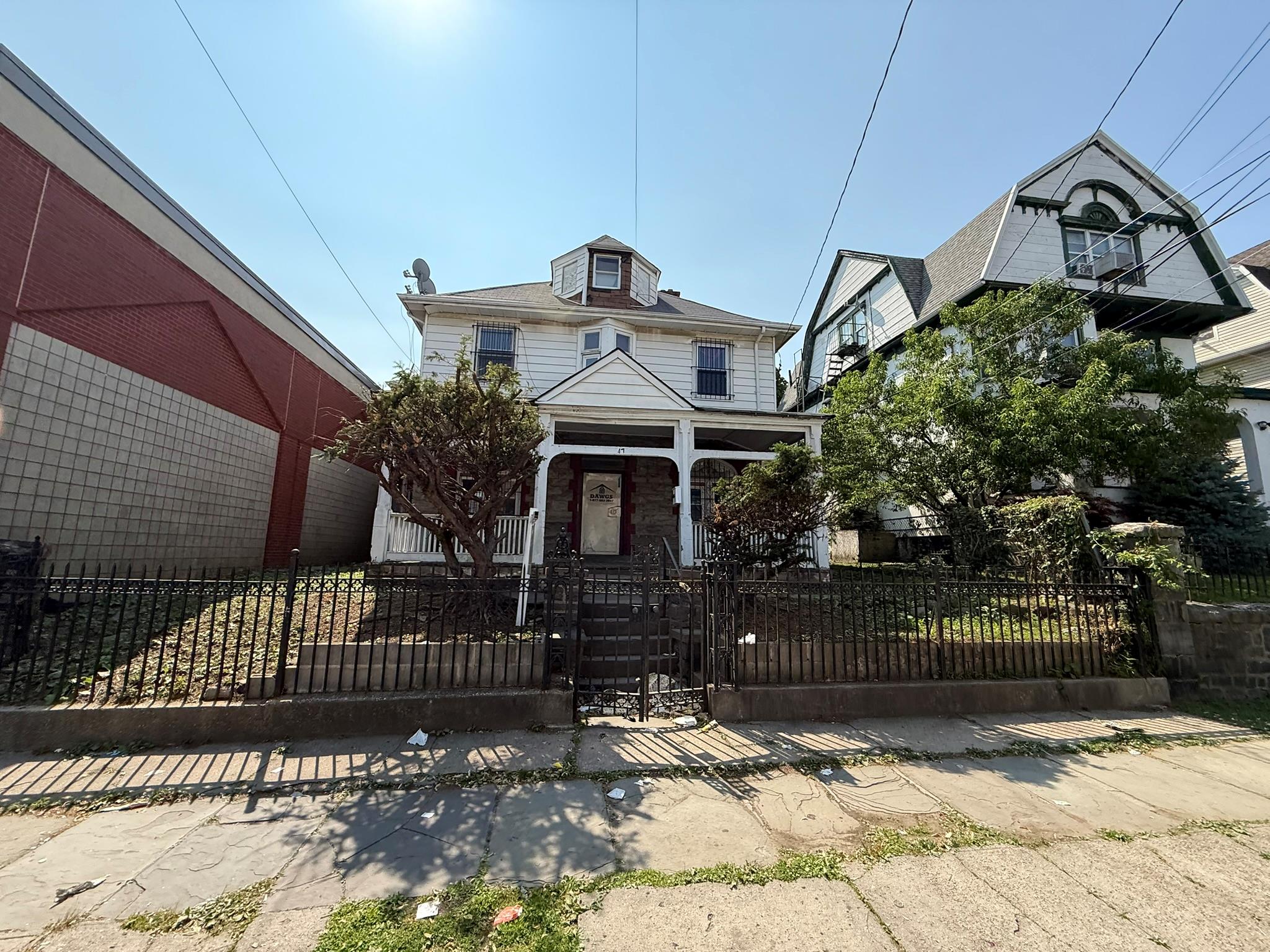 Nestled in the heart of vibrant downtown Yonkers, this commanding whit...