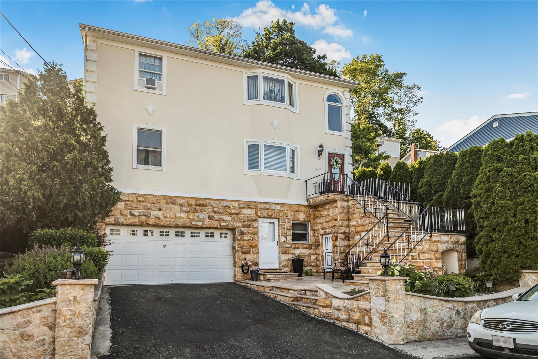 A MUST SEE Immaculate spacious stucco two family home with walk out ba...