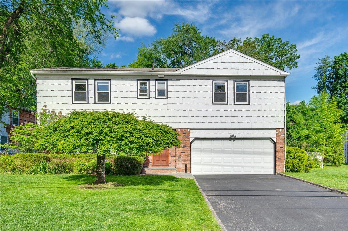 Welcome to this beautifully maintained split-level home located in the...
