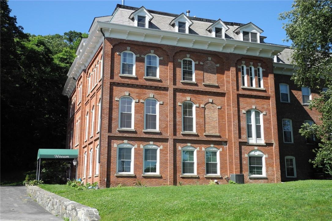 Beautiful riverfront SOHO style loft in converted 1800s brick schoolho...