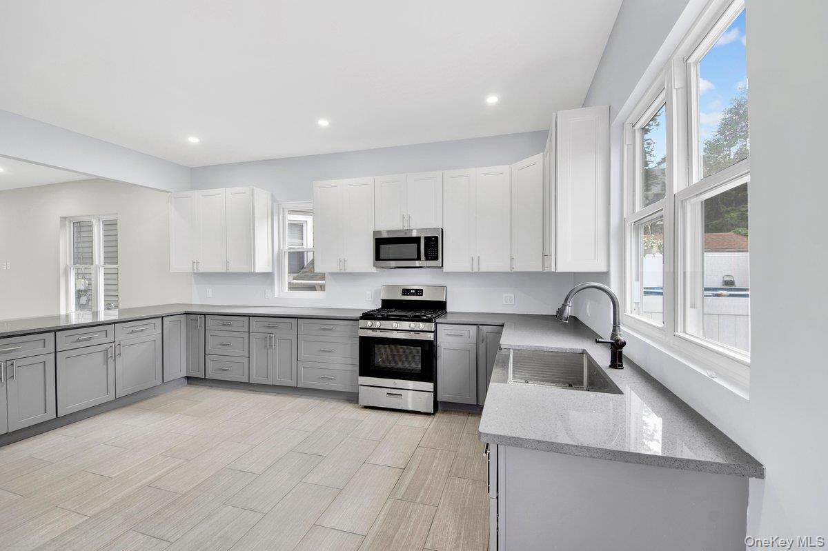 Back on the MARKET! Beautiful Kimball AREA's 
 Finest GUT Renovated Mu...