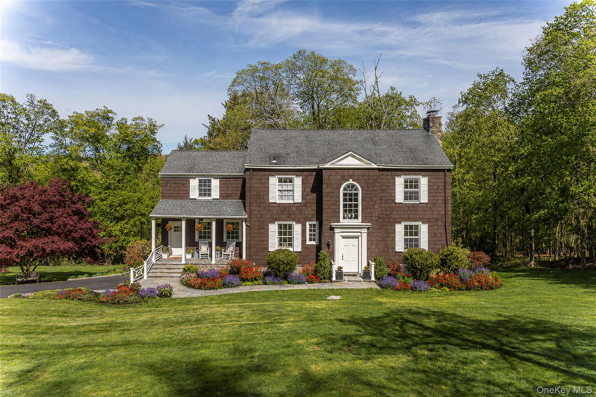 Refined and timeless, this beautifully renovated 1930 Center Hall Colo...