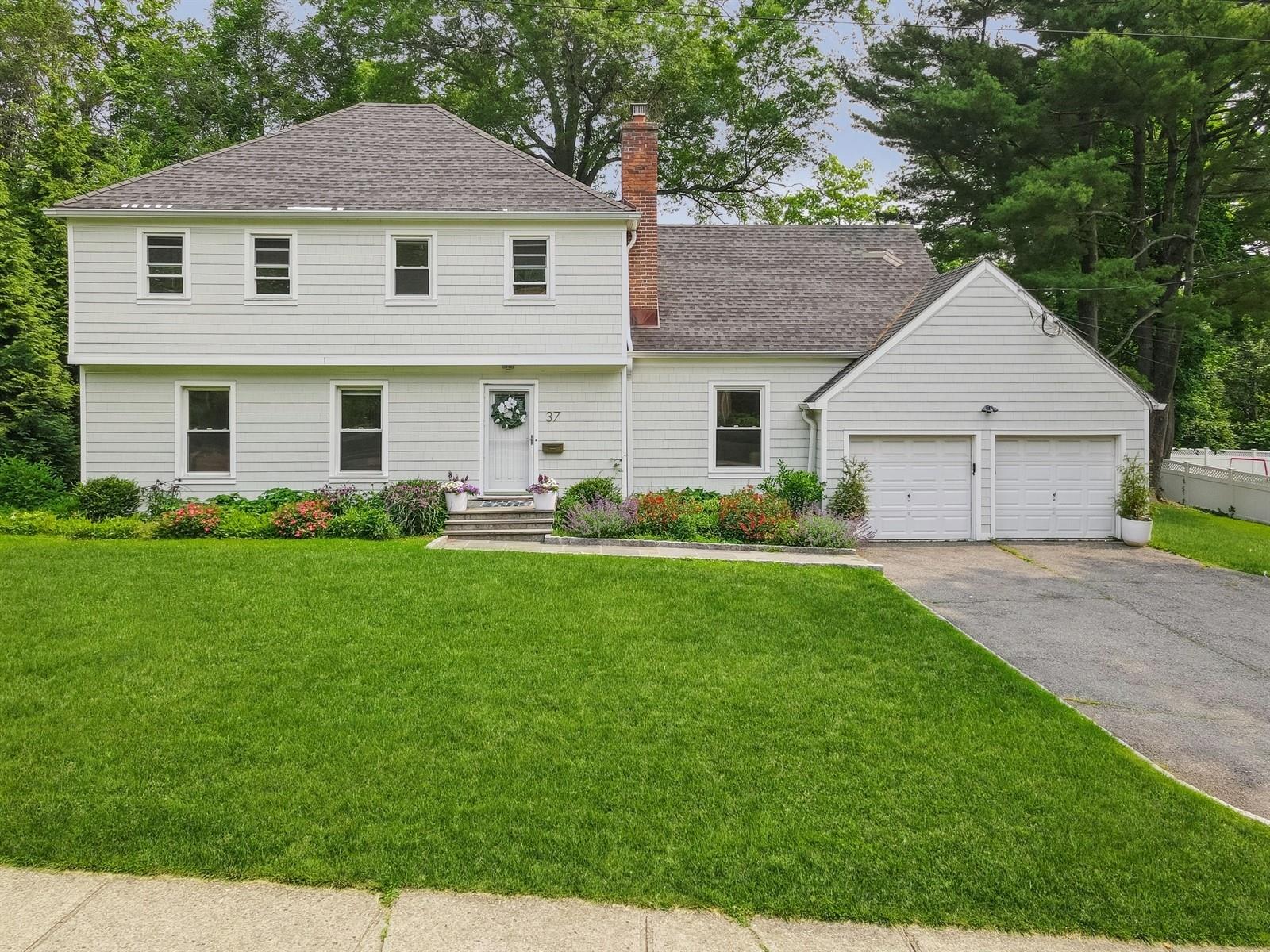 Welcome to this beautifully maintained 4 bedroom, 2 and a half bath Co...