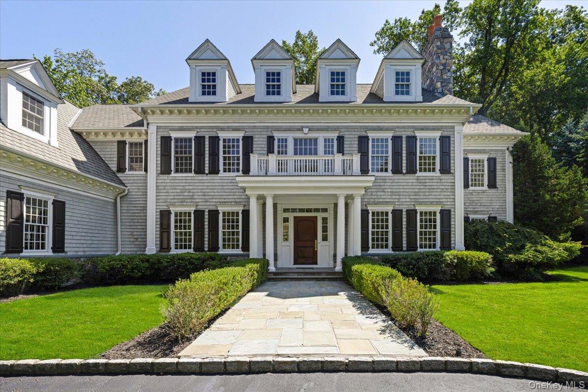 Welcome to 1 Cedar Lane, an elegant shingle-style Colonial nestled in...