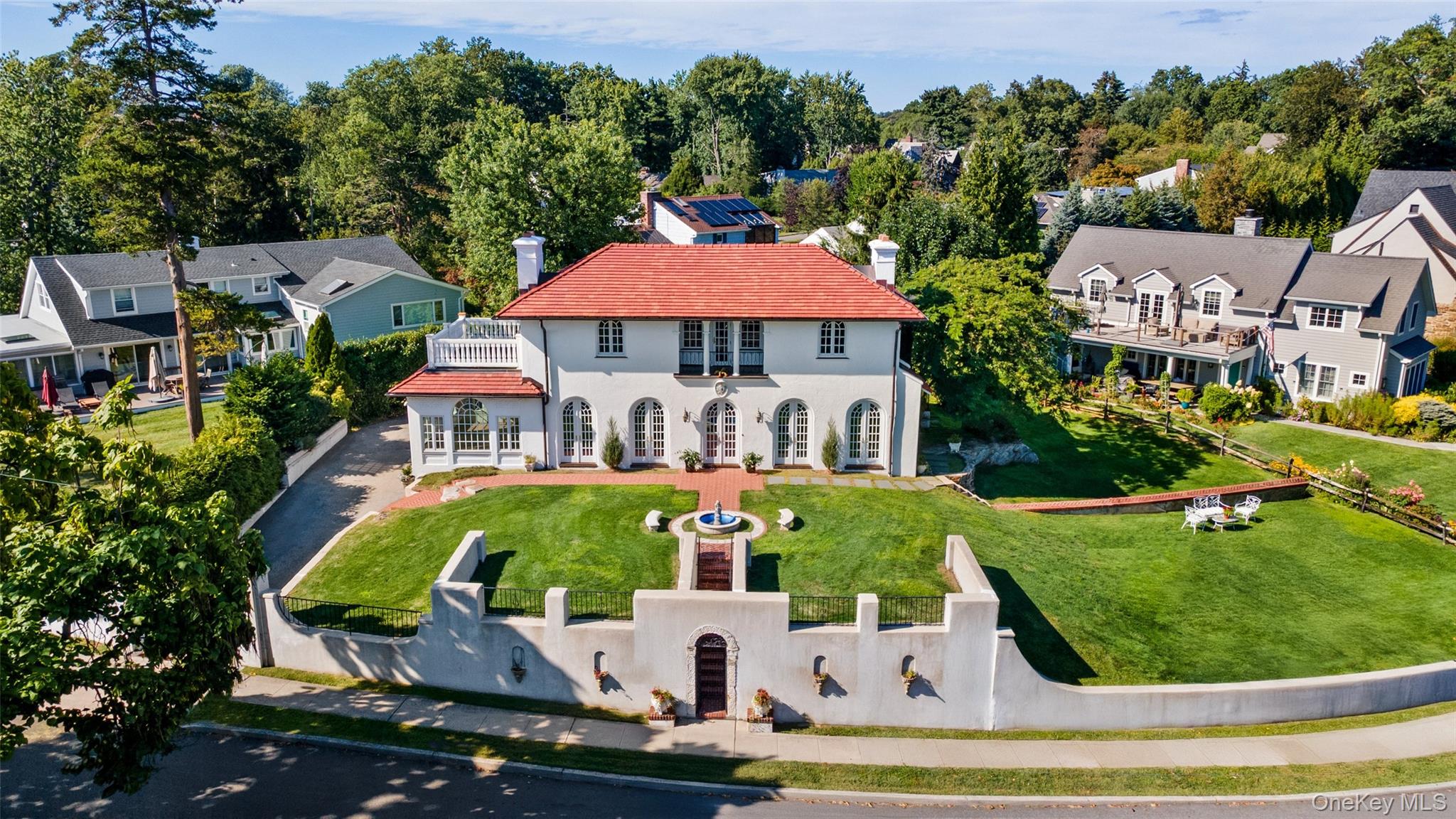 Rare find! Mediterranean gem overlooking the Sound with piazza, founta...