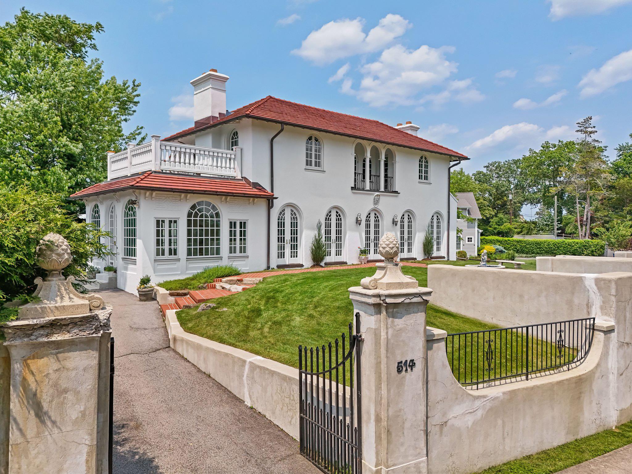 Rare find! Mediterranean gem overlooking the Sound with piazza, founta...