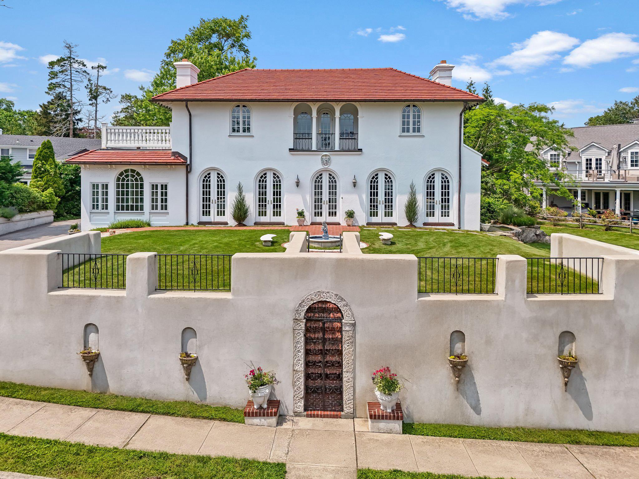 Rare find! Mediterranean gem overlooking the Sound with piazza, founta...