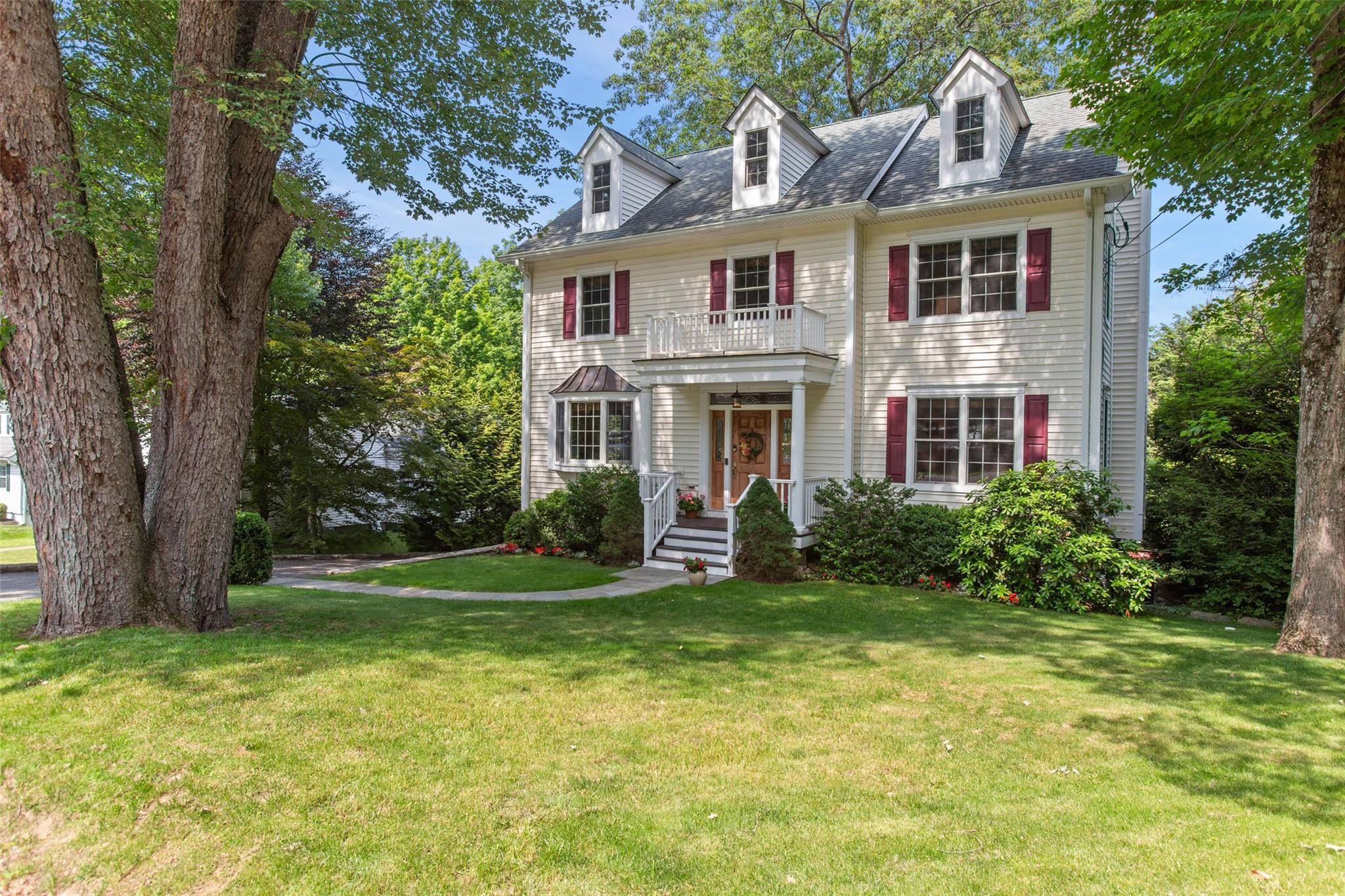 This 2010 Classic Center Hall Colonial "lives like" a 3-bedroom and ha...