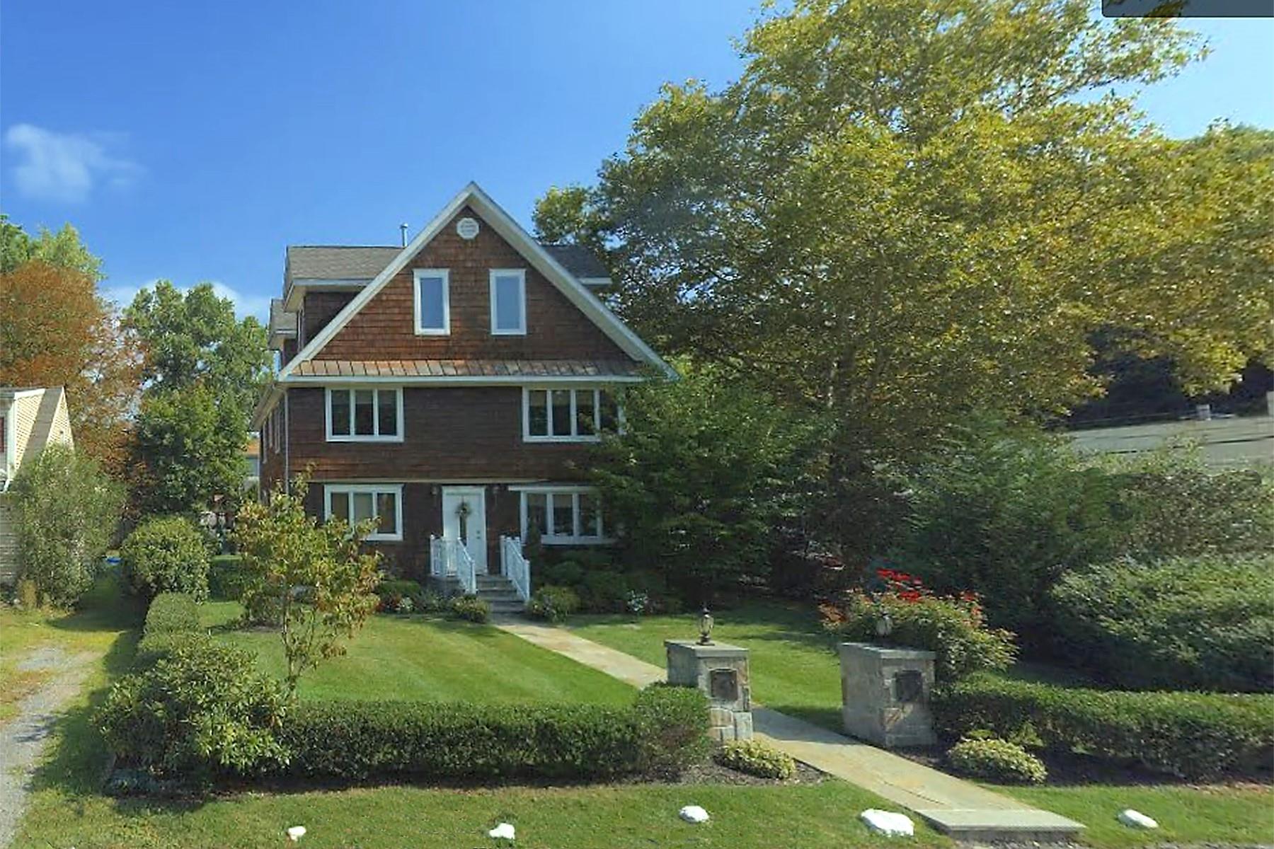 This immaculate Two Family Home with separate garage shows like new! A...
