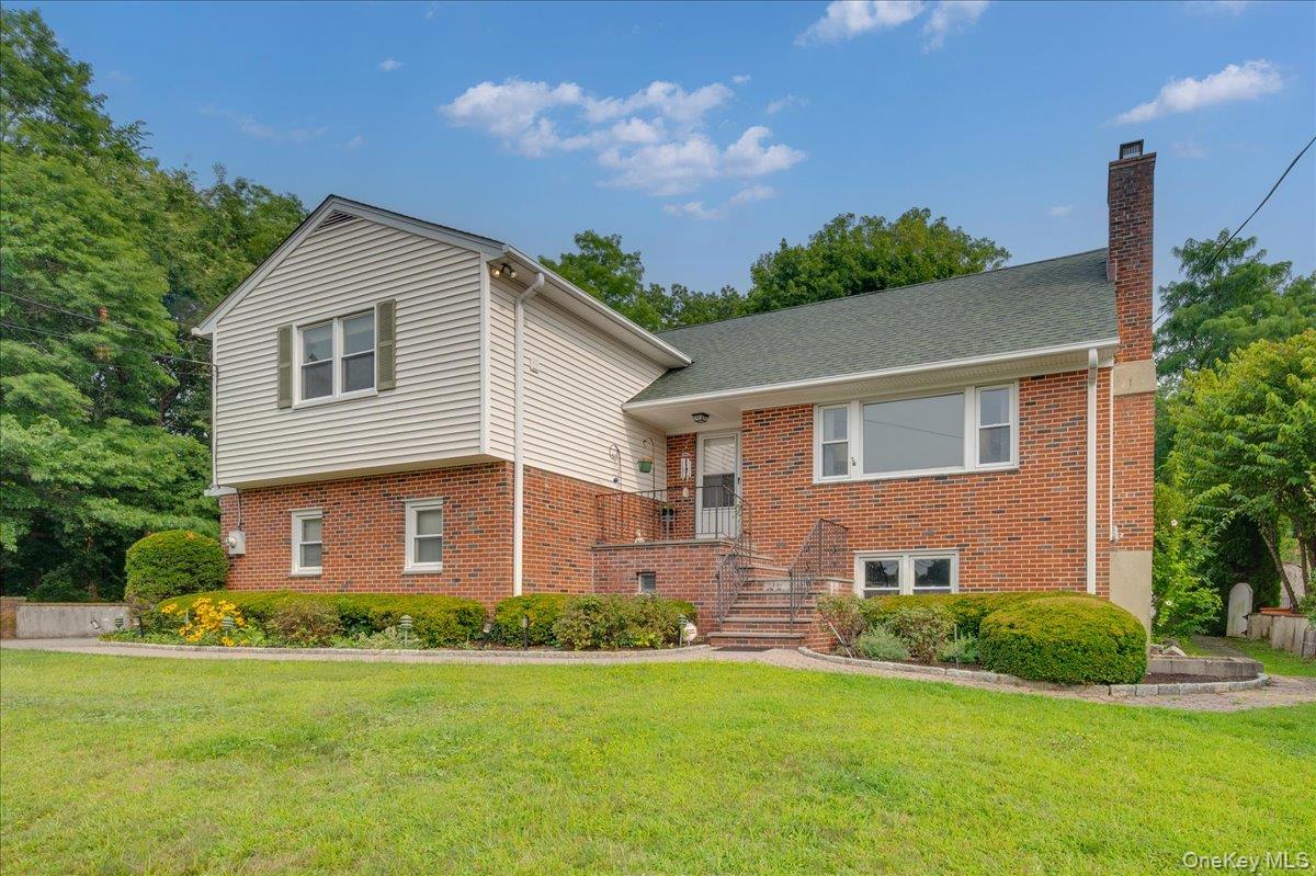 Proudly perched atop 22 Shelton Street, this classic split-level home...