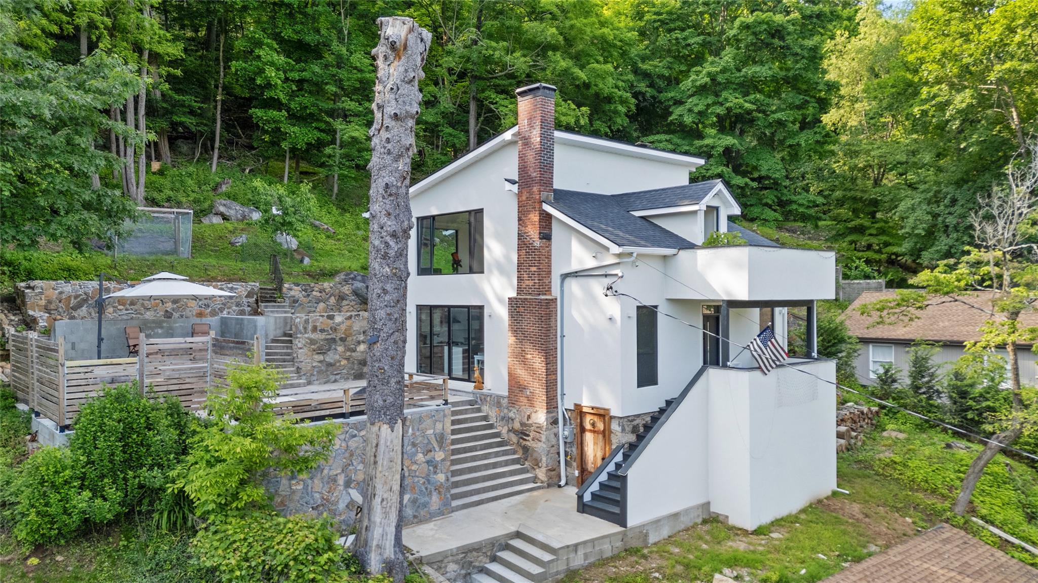 Modern Living Meets Natural Beauty in the Heart of Pleasantville. Perc...