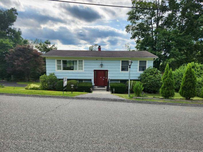 Welcome to this turnkey charming ranch! It offers an open concept, spa...