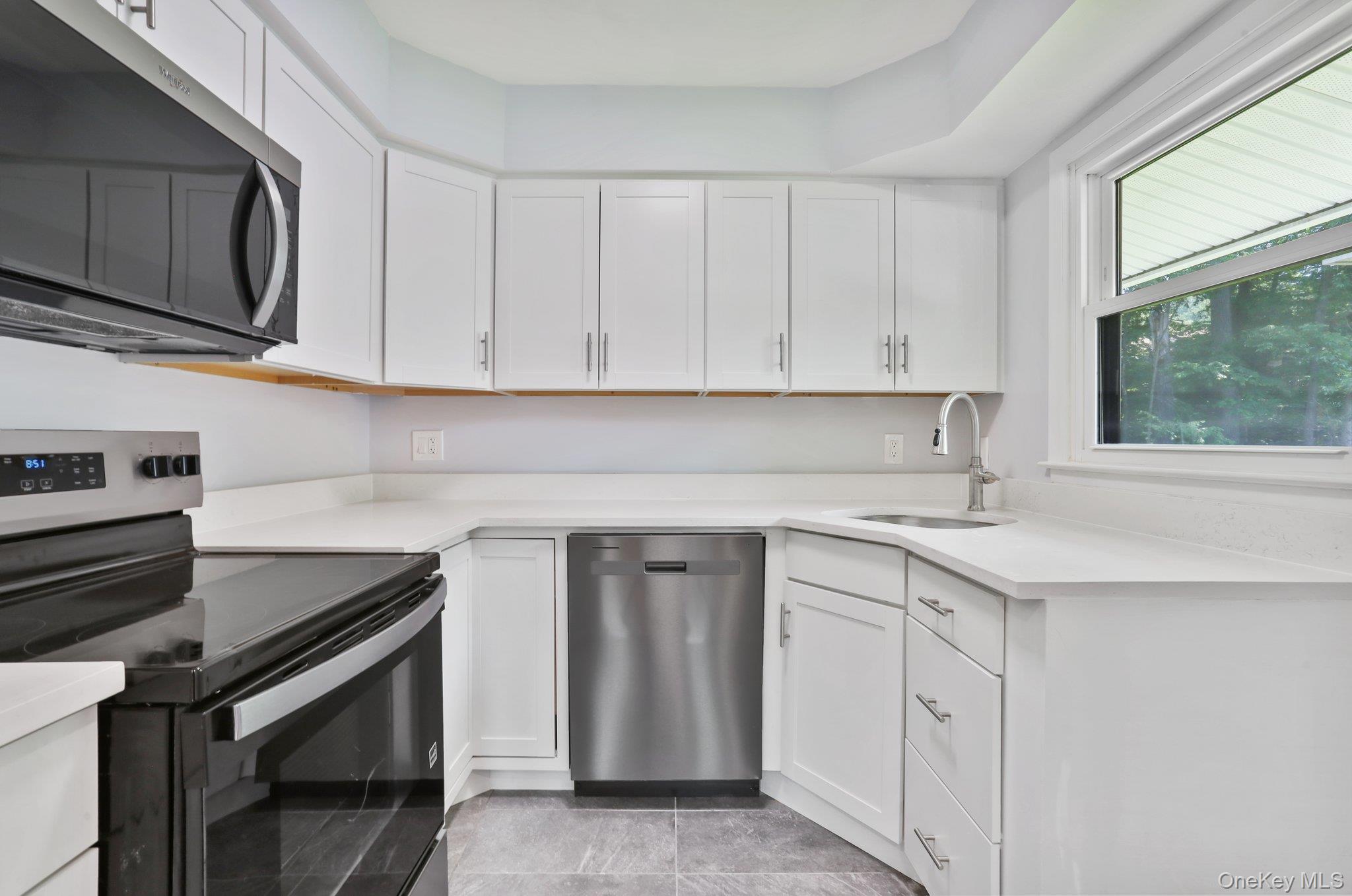 Welcome to 34 Warwick Pl #D! This bright and updated 2nd floor condo f...