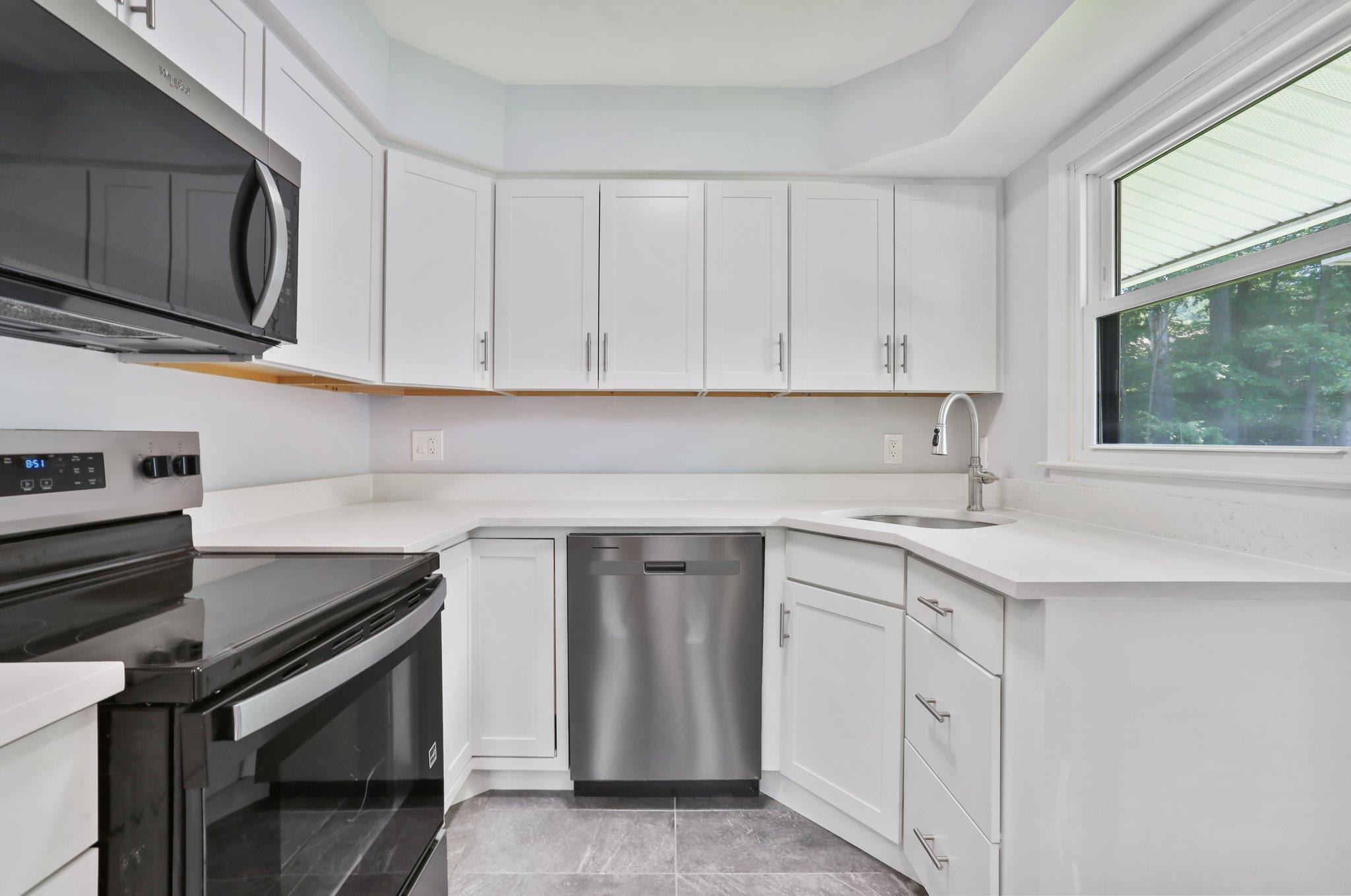 Welcome to 34 Warwick Pl #D! This bright and updated 2nd floor condo f...