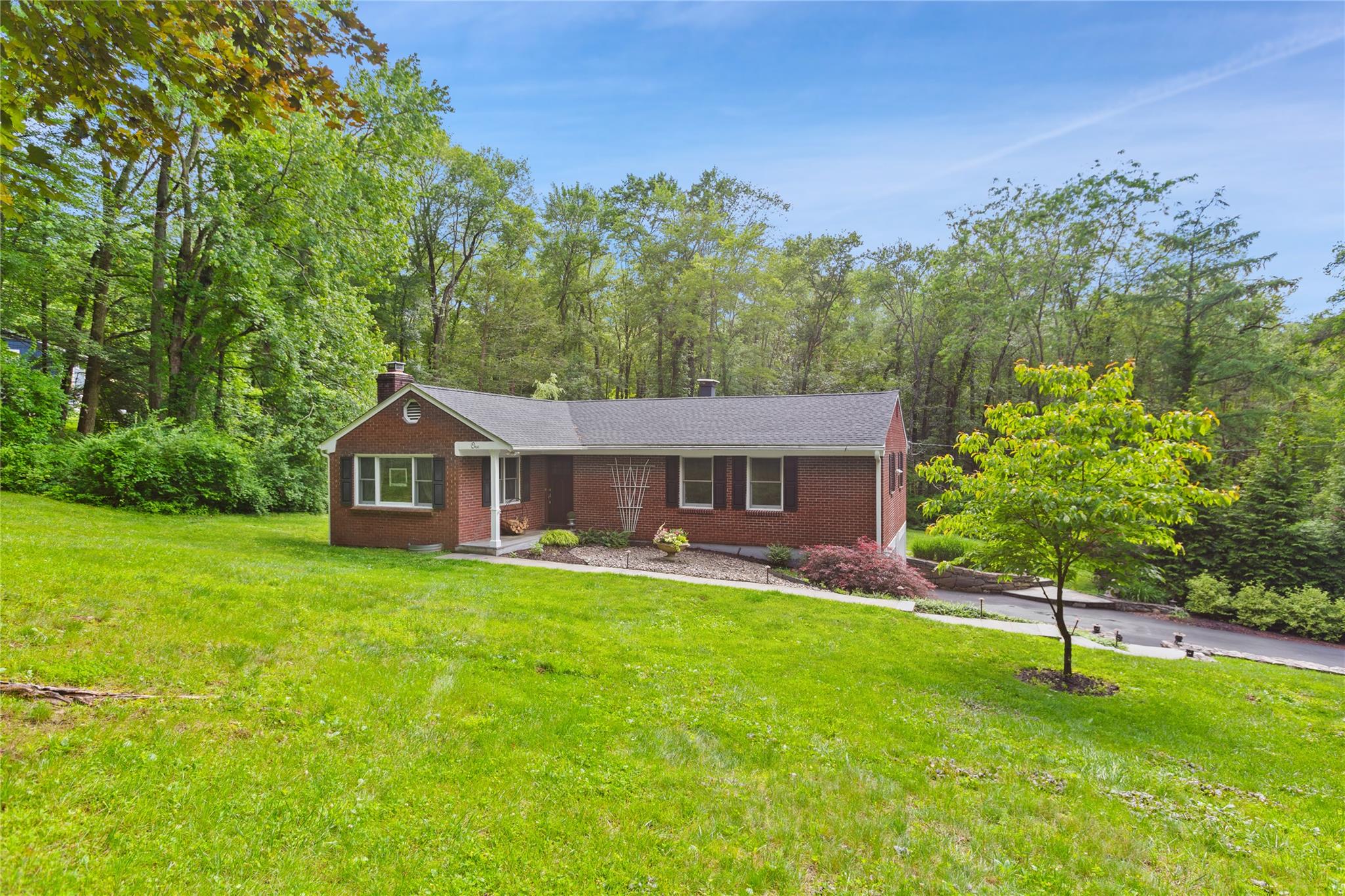 Nestled in a private lake community, this beautifully updated 3-bedroo...