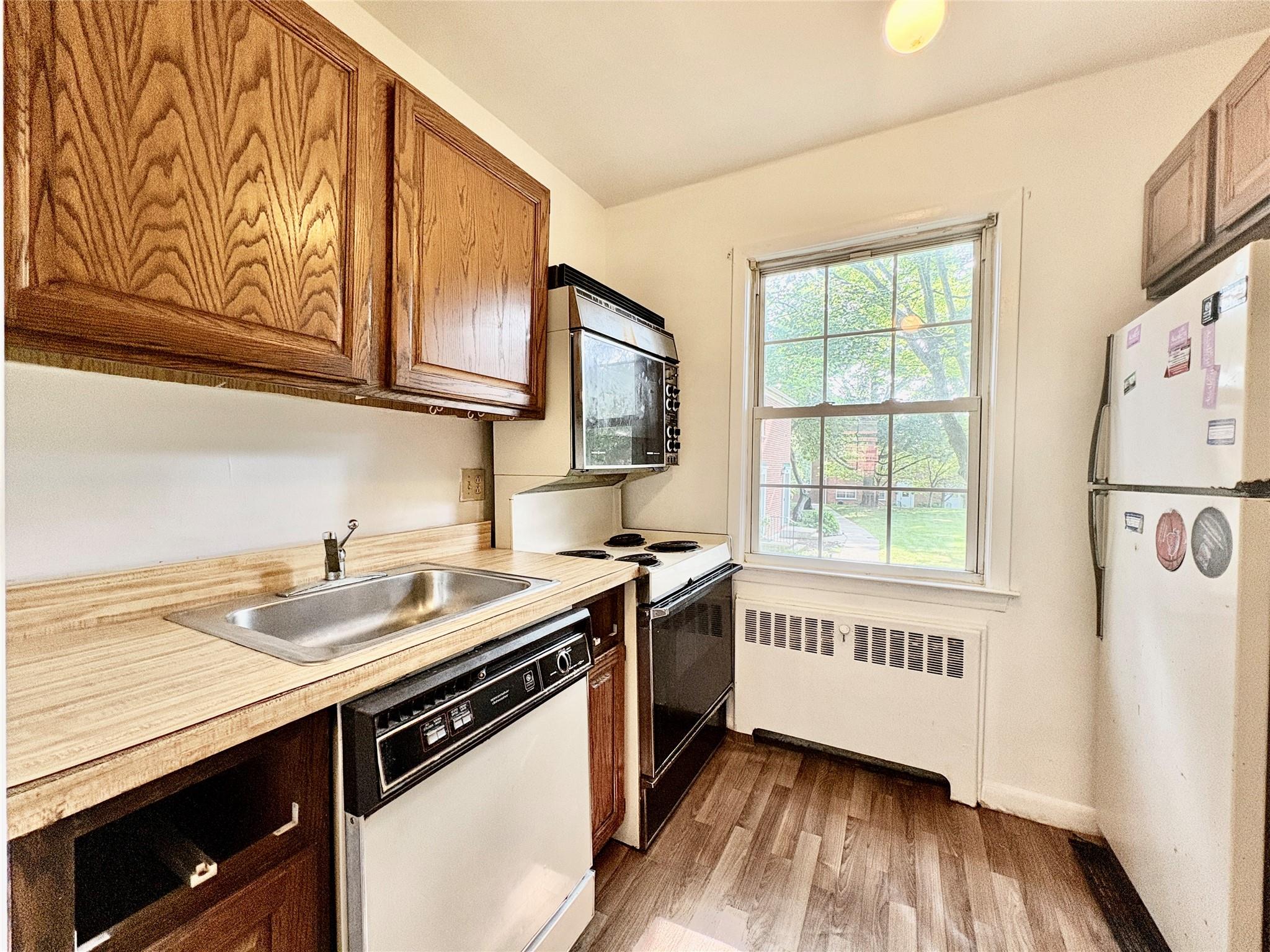 Welcome to Rex Ridge! This bright and spacious studio co-op offers a f...