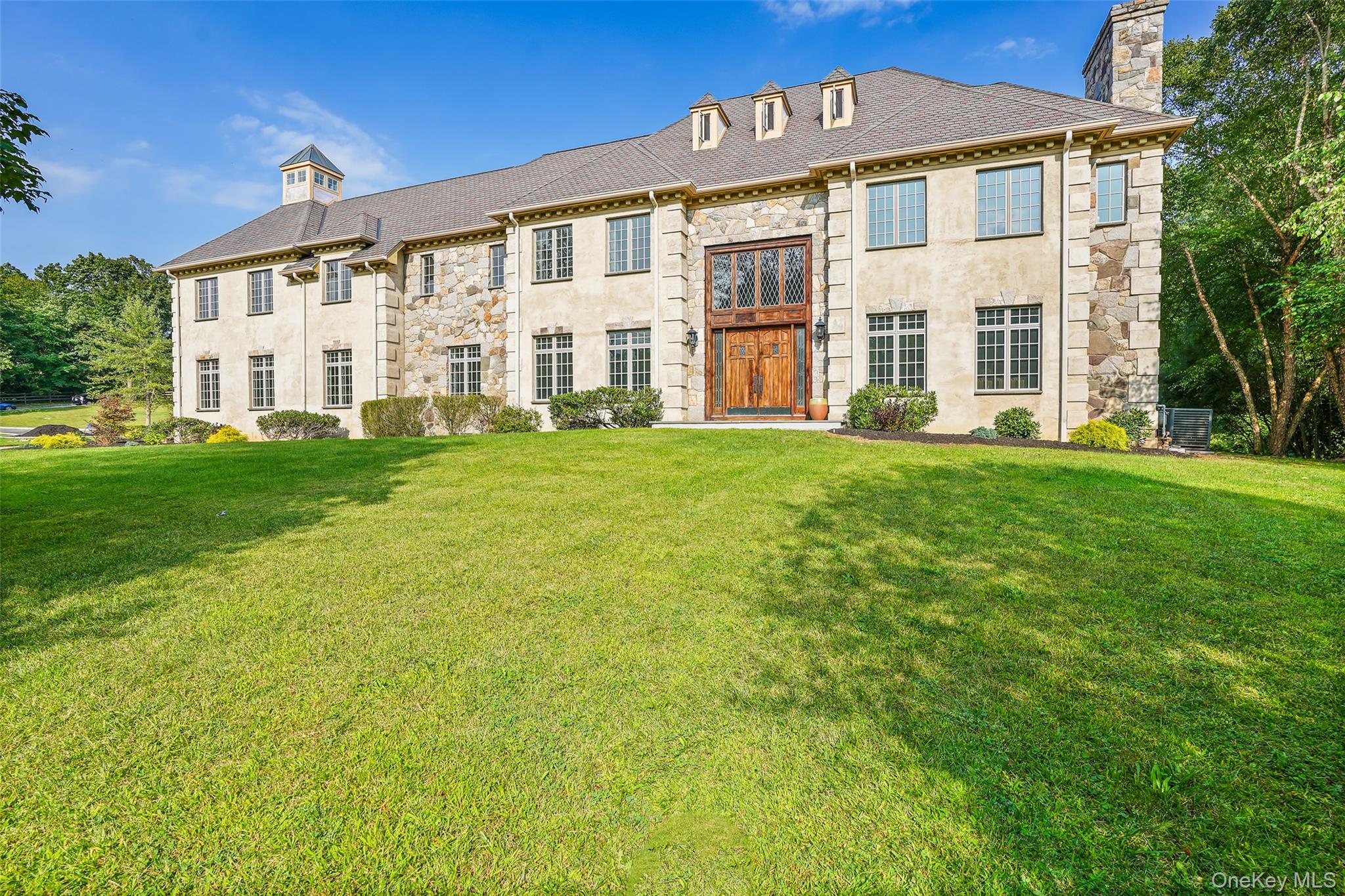 Experience refined living in this breathtaking 5,600+ sq ft contempora...