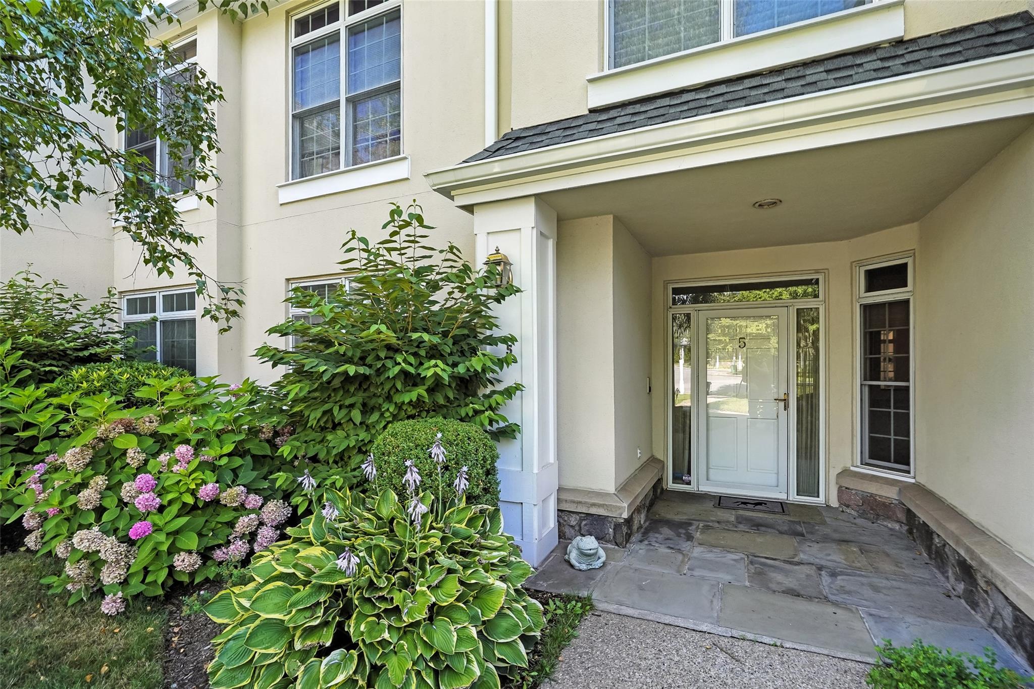 Welcome to Doral Greens! Enjoy effortless living in this beautifully m...