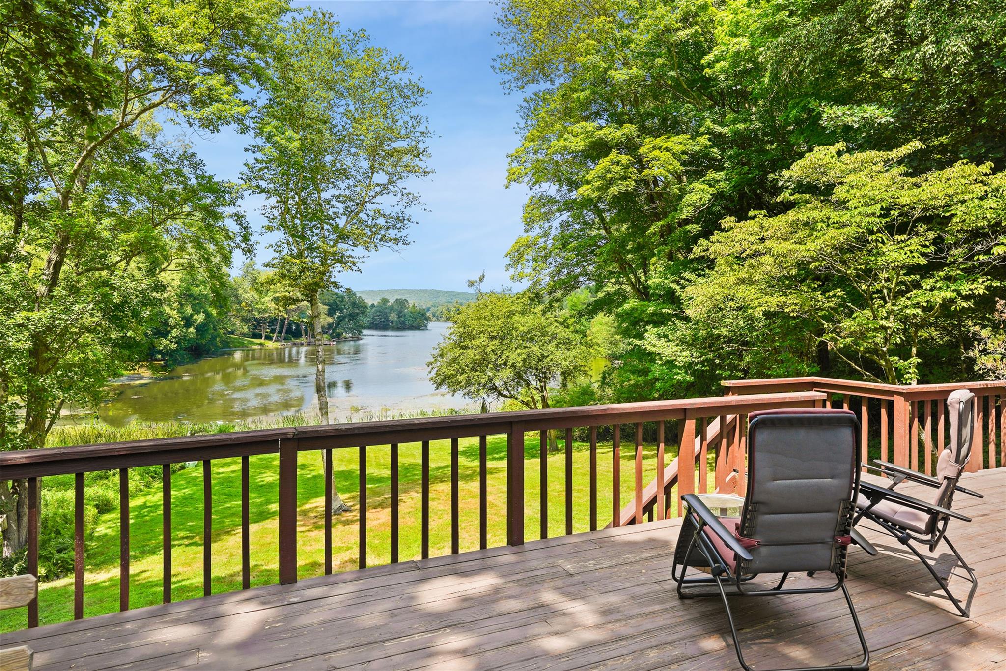 SPECTACULAR WATERFRONT. Positioned to capture light and views! Remarka...
